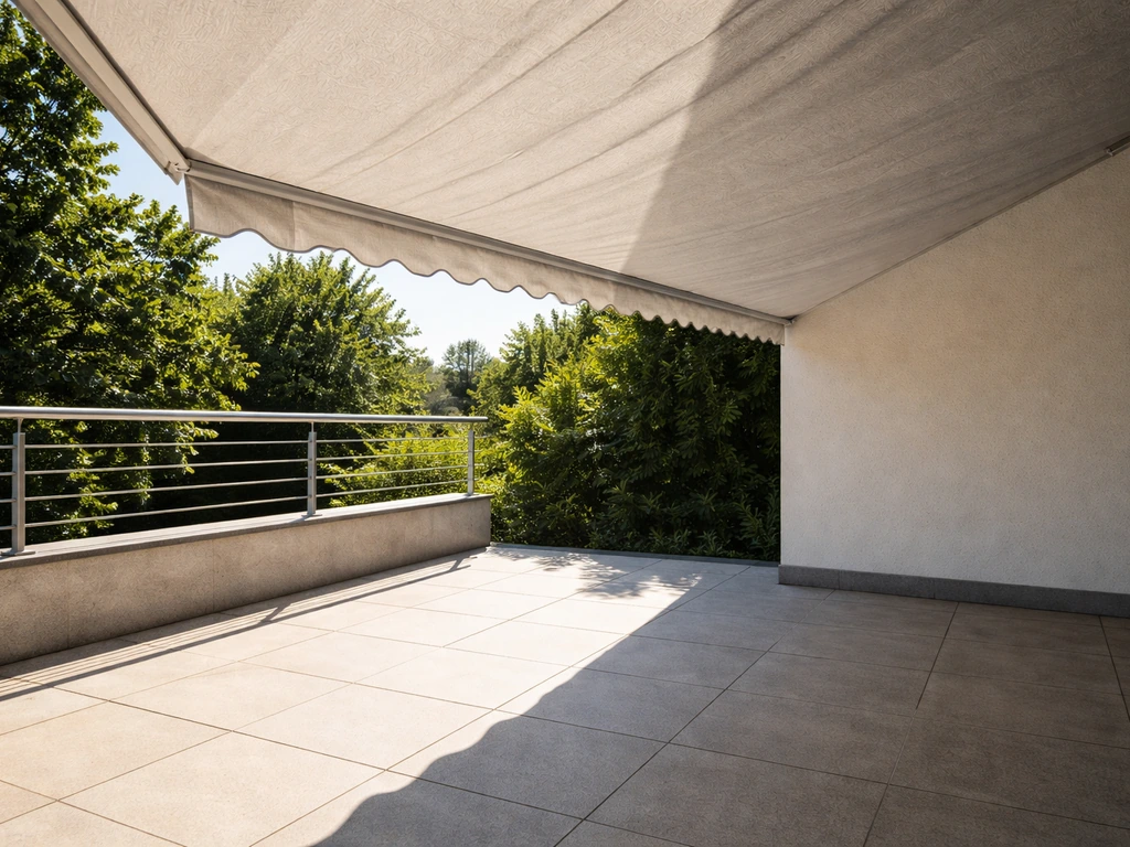 Patio awning deployed, showing bright sun on one side and shaded comfort under the canopy.
